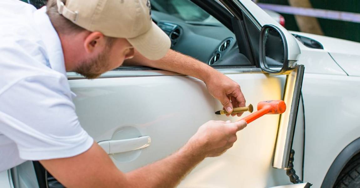 paintless dent repair technician